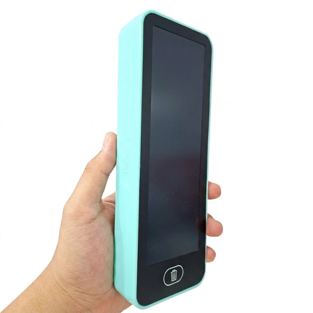 Mint green LCD writing tablet screen held in hand showing display