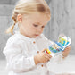 Toddler playing with flip up sounds phone toy